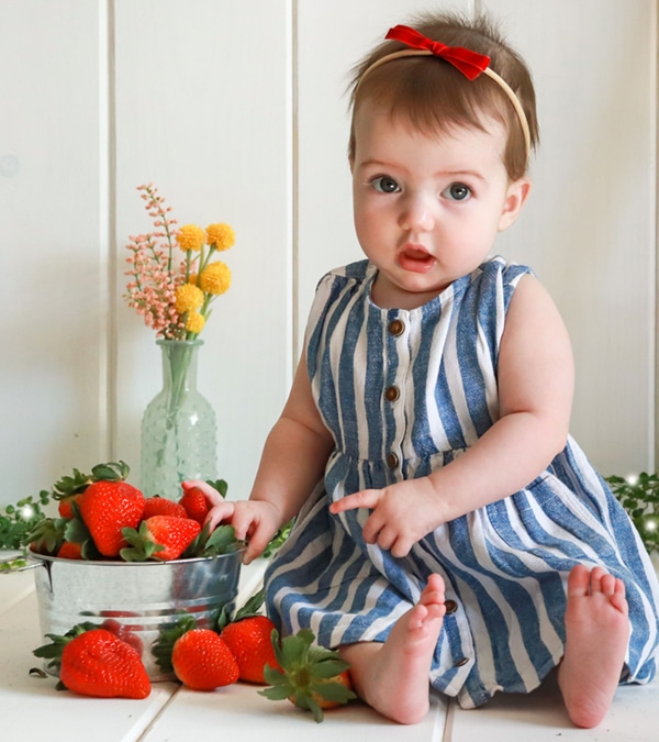baby and strawberries